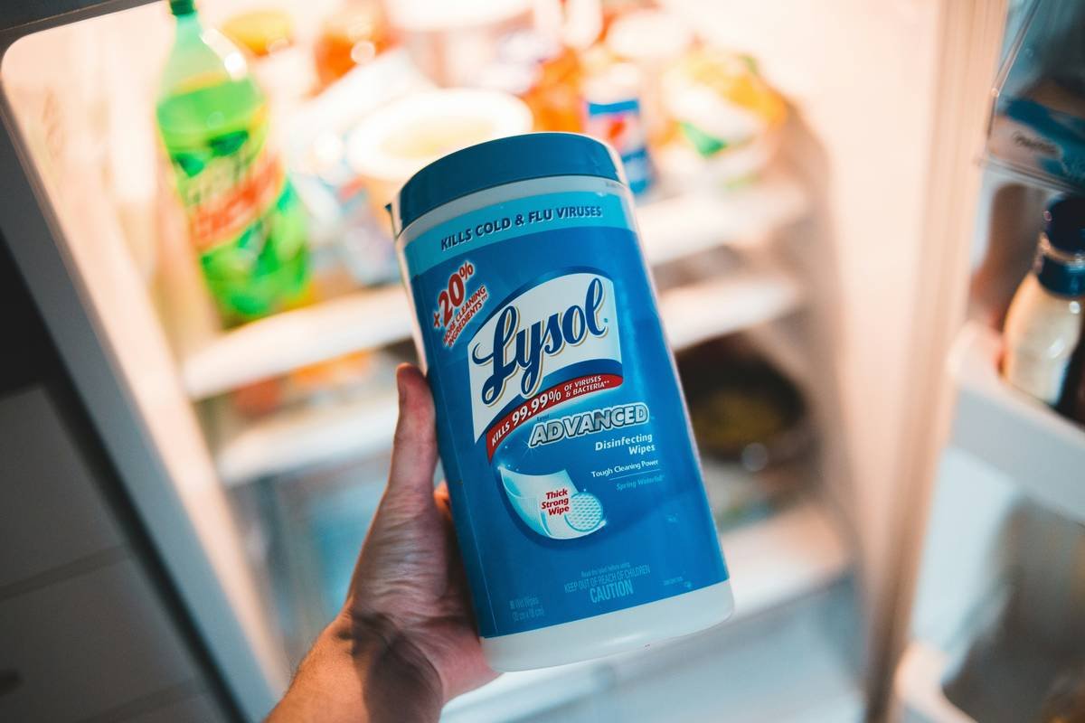 Side-by-side comparison chart of ingredients in conventional sanitizing wipes vs. all clean natural sanitizing wipes showing harmful chemicals versus plant-based alternatives